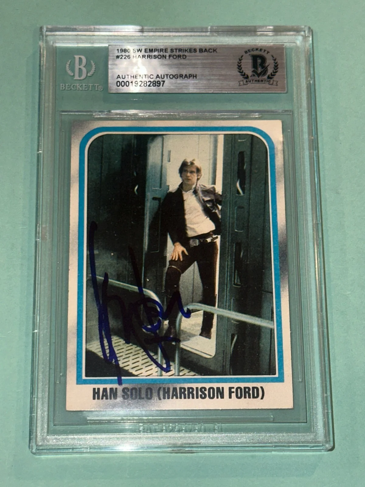 HARRISON FORD — HARRISON FORD Signed 1980 STAR WARS EMPIRE Card #226 Beckett BAS