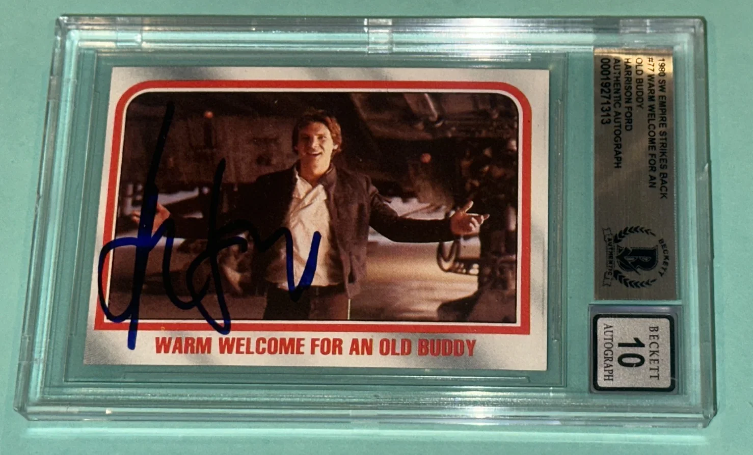 HARRISON FORD — HARRISON FORD Signed 1980 STAR WARS EMPIRE WELCOME Card #77 Beckett BAS AUTO 10