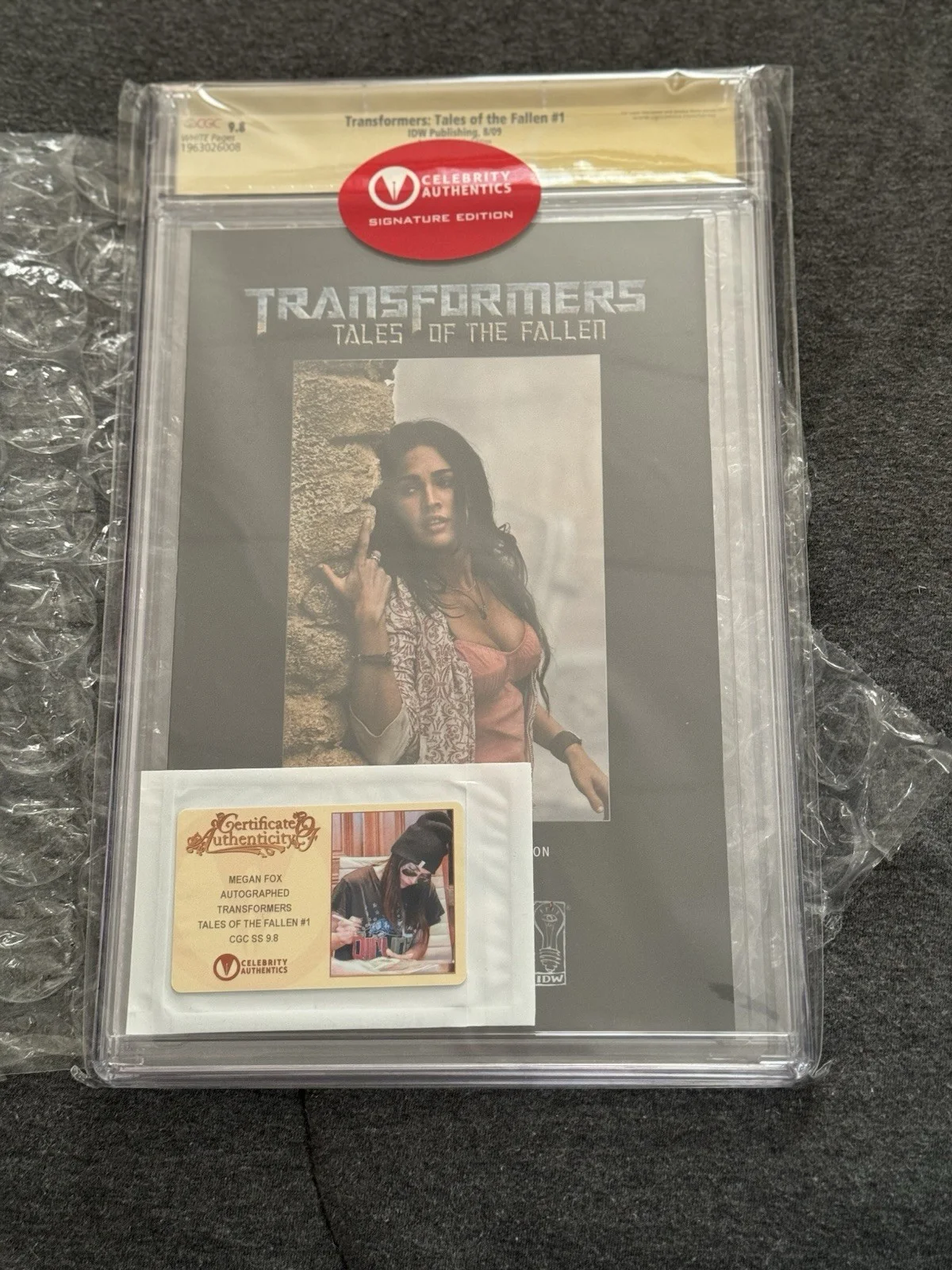 Megan Fox The Tales Of The Fallen Signed Transformers 9.8 Celebrity Authentic, изображение 2