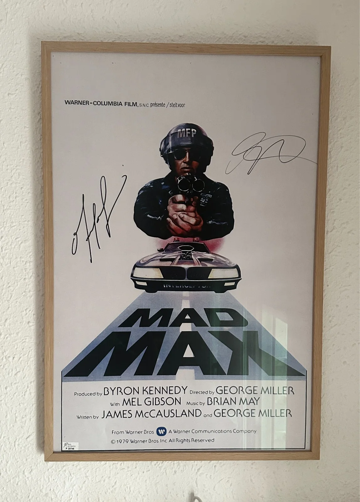 Mel Gibson and George Miller — Mad Max 1979 Poster Signed Mel Gibson & George Miller COA Framed Richard Amsel