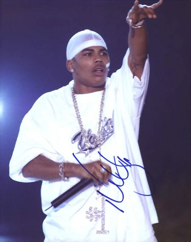 Nelly — Nelly Nell authentic signed rap 8x10 photo W/Certificate Autographed (A0989)