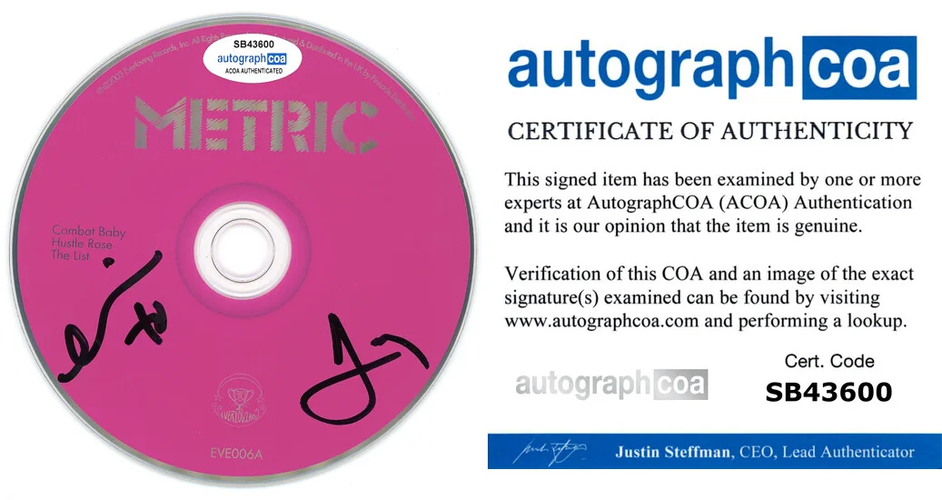 METRIC - EMILY HAINES & JAMES SHAW — Emily Haines & James signed "METRIC" Combat Baby CD Rare ACOA COA