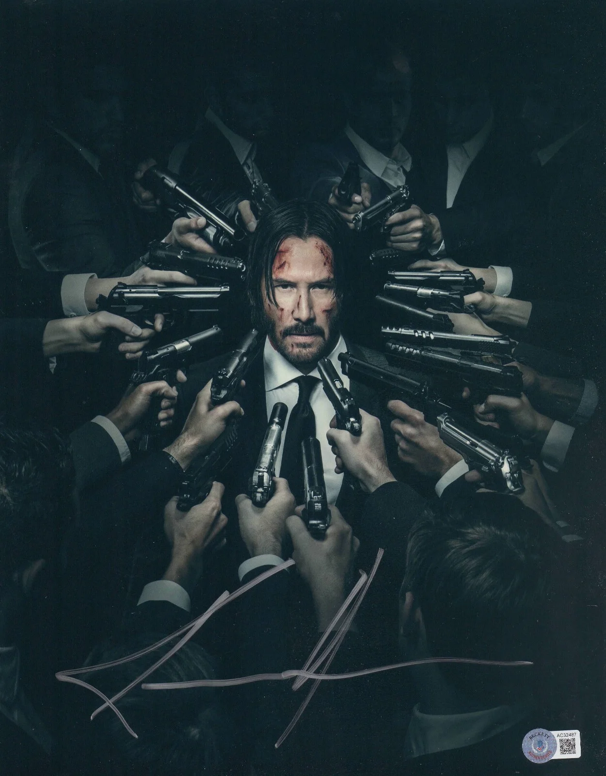KEANU REEVES — KEANU REEVES SIGNED JOHN WICK 11X14 METALLIC PHOTO AUTOGRAPH BAS BECKETT COA