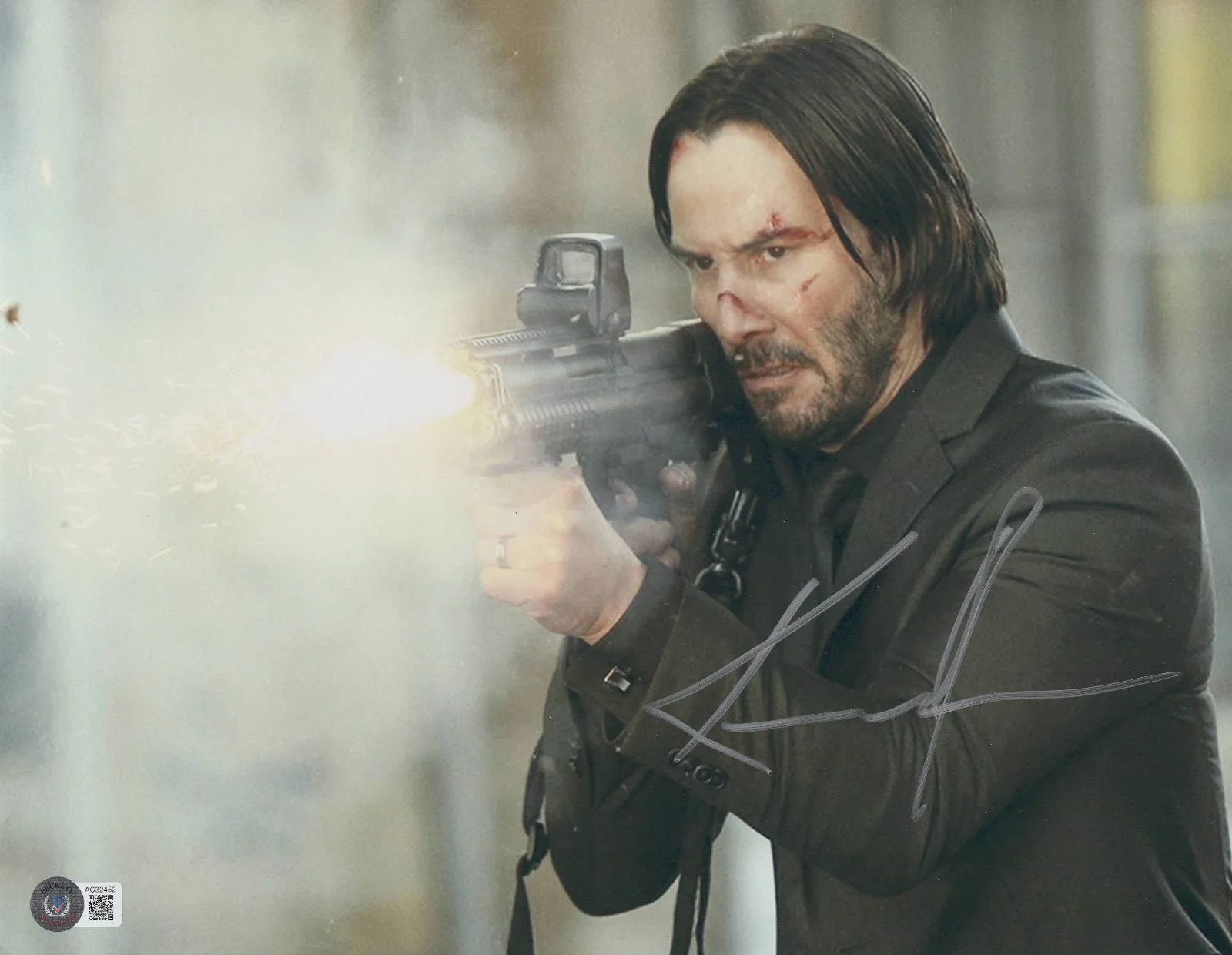 KEANU REEVES — KEANU REEVES SIGNED JOHN WICK 11X14 METALLIC PHOTO AUTOGRAPH BAS BECKETT COA