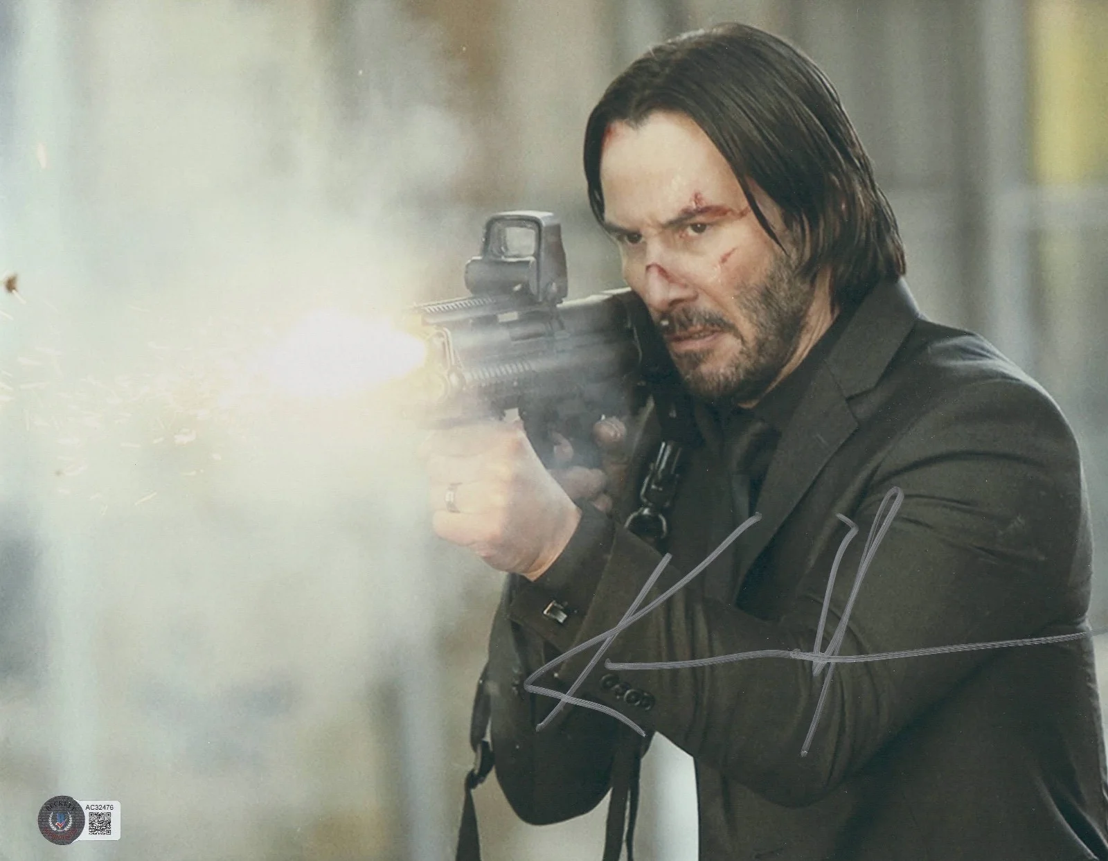 KEANU REEVES — KEANU REEVES SIGNED JOHN WICK 11X14 METALLIC PHOTO AUTOGRAPH BAS BECKETT COA