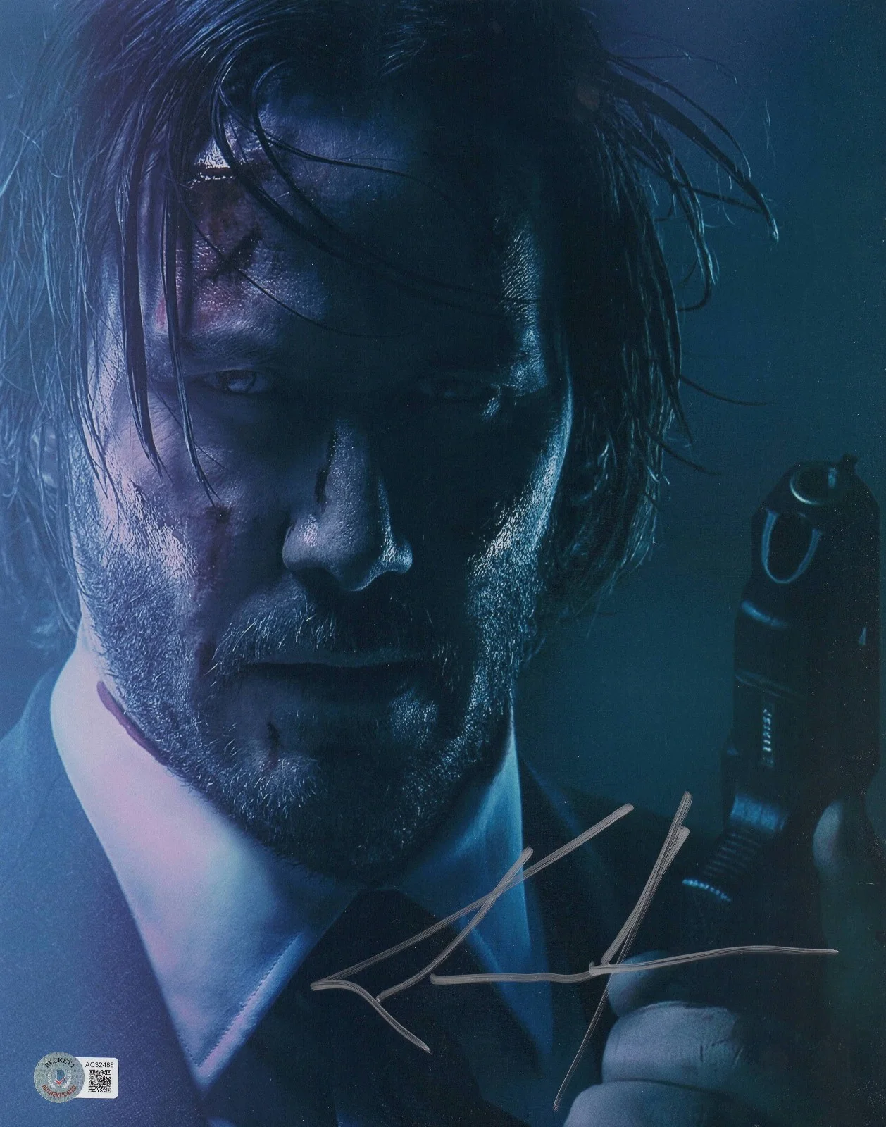 KEANU REEVES — KEANU REEVES SIGNED JOHN WICK 11X14 METALLIC PHOTO AUTOGRAPH BAS BECKETT COA