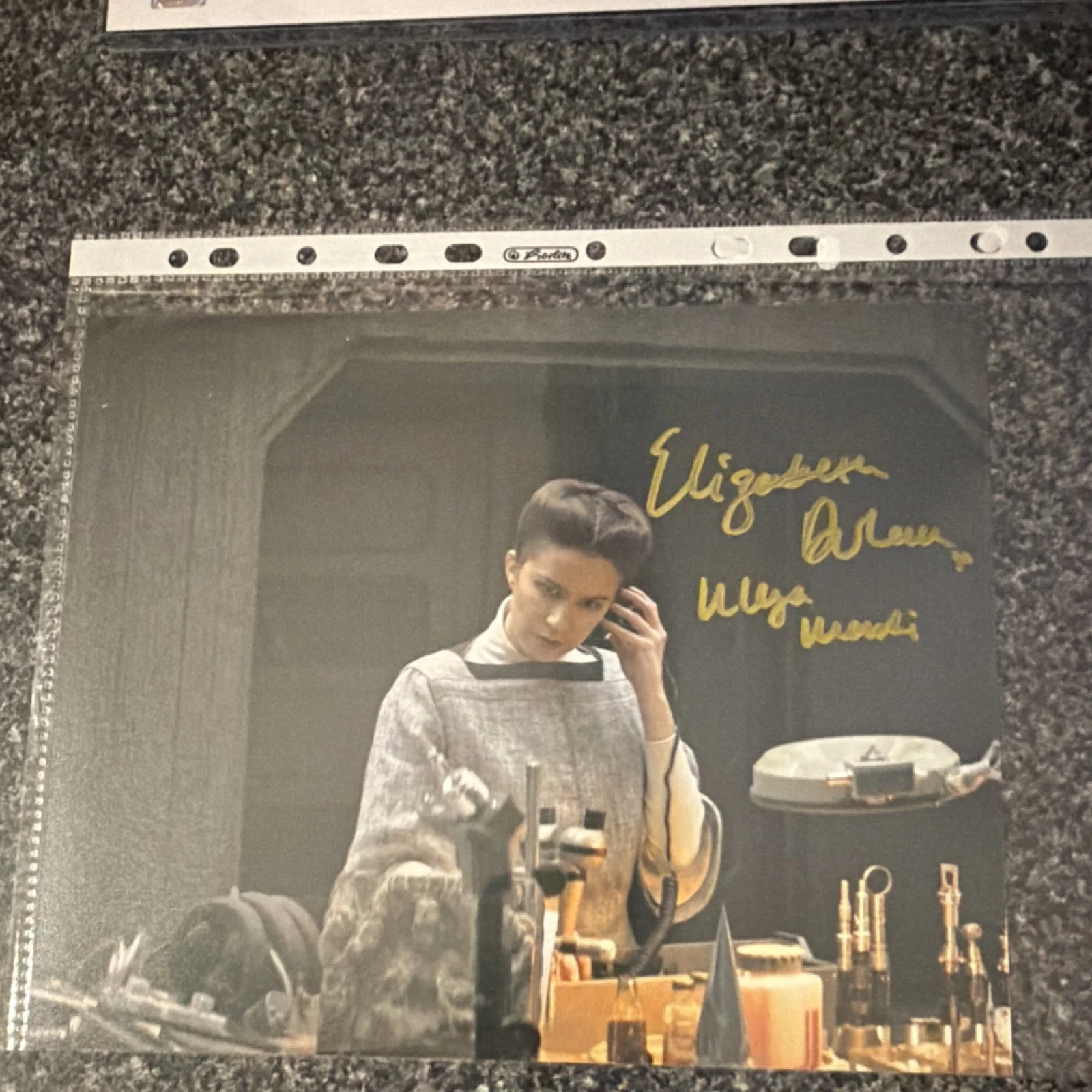 Elizabeth Olsen — Elizabeth Dulau Autographed 8x10 photograph. Andor with character name