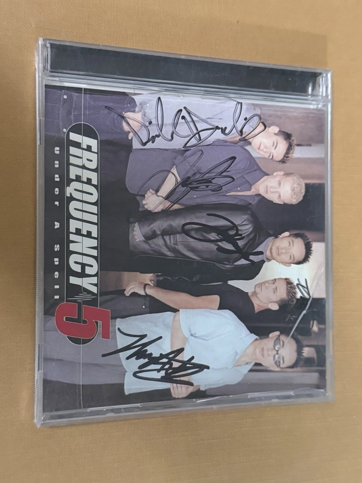 Frequency Five Under A Spell Signed CD Rare Autographed, изображение 2