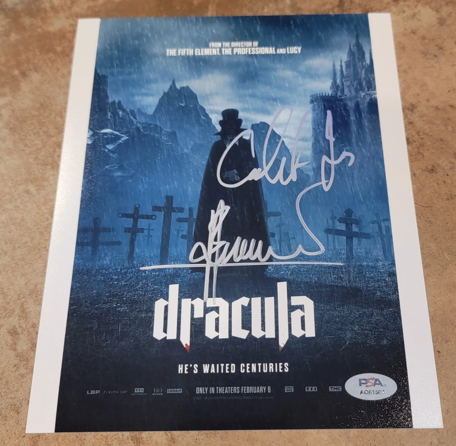 Caleb Landry Jones, Luc Besson — Caleb Landry Jones Luc Besson signed 8x10 photo autograph PSA DNA Dracula cast