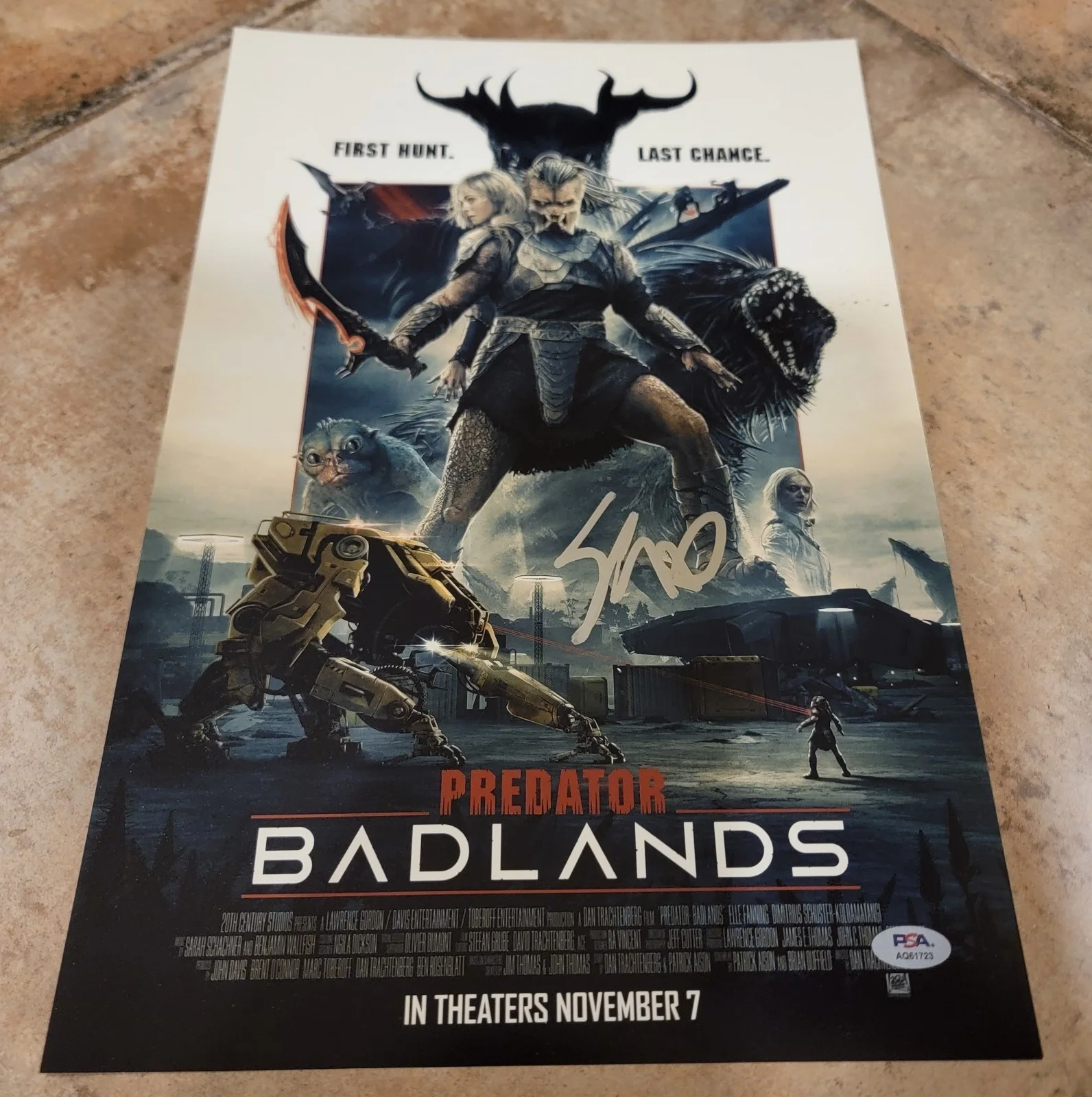 Elle Fanning — Elle Fanning signed 12x18 photo autograph PSA DNA Predator Badlands poster