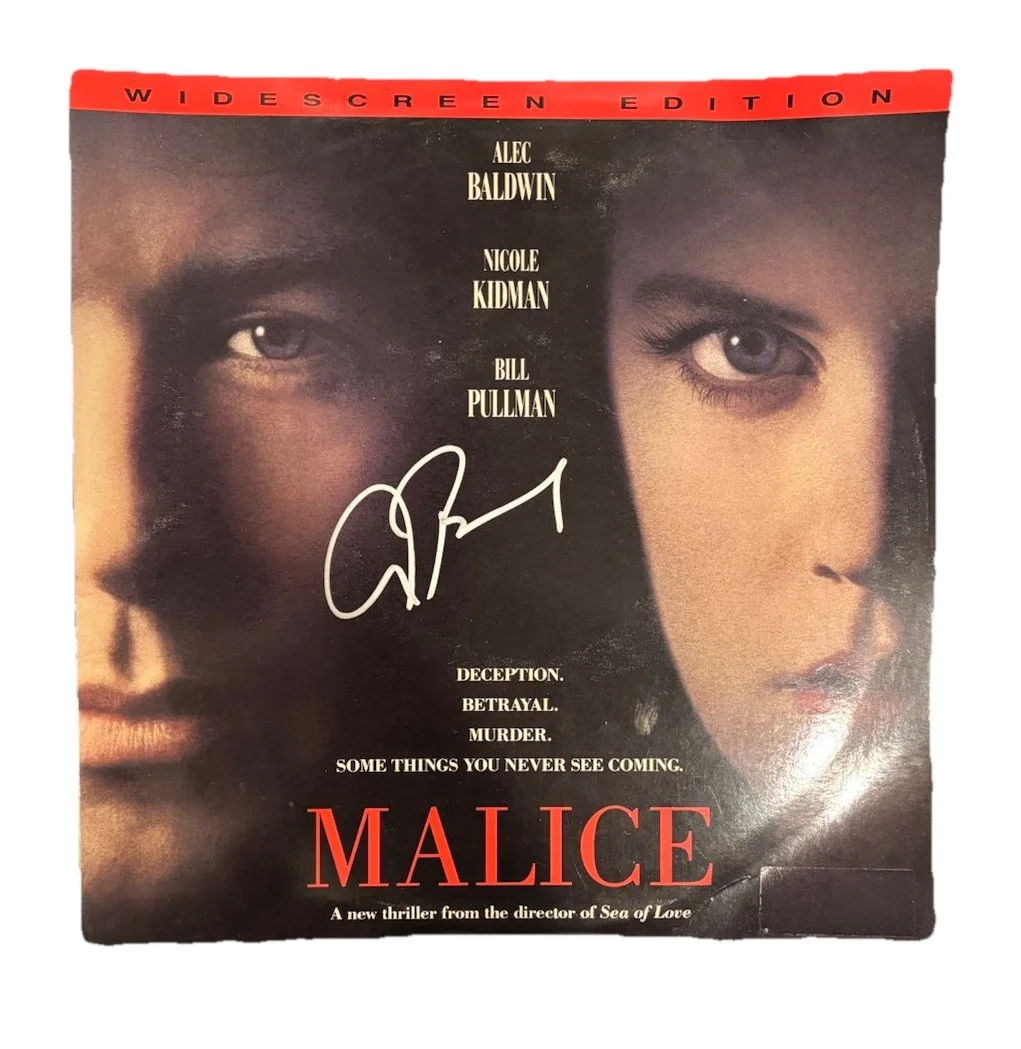 Alec Baldwin — Alec Baldwin Malice Signed Autographed Movie Laserdisc