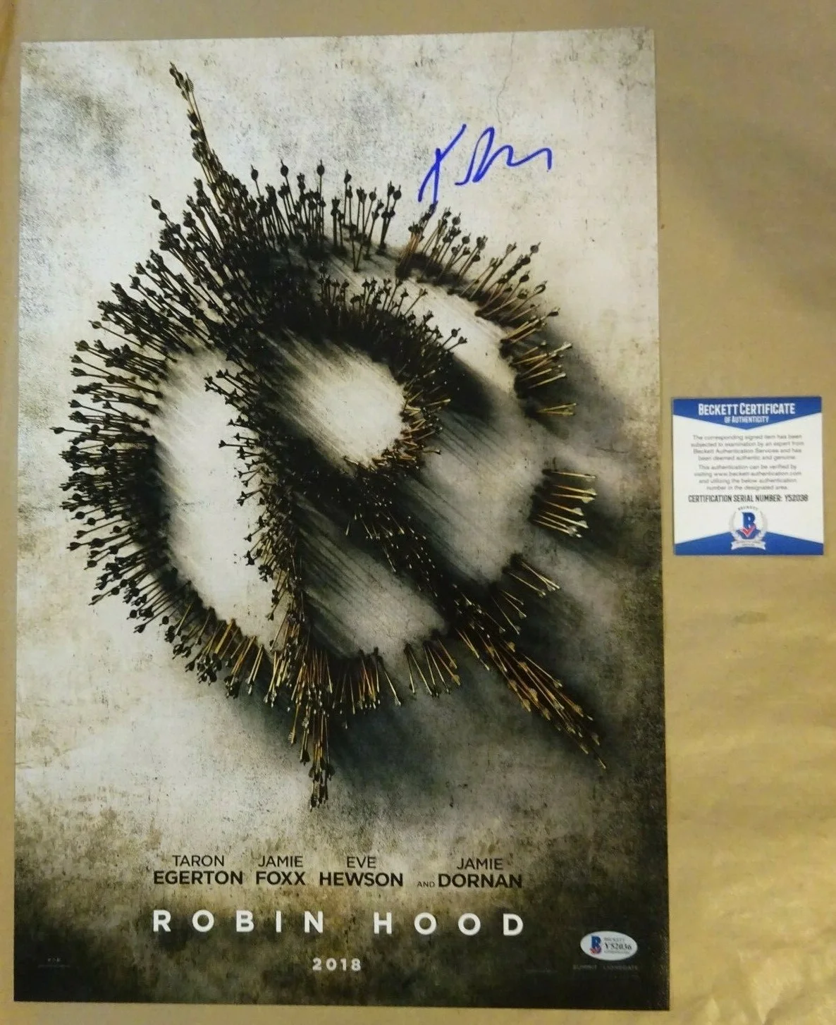 Taron Egerton — Signed TARON EGERTON Autographed ROBIN HOOD 12"x18" Photo BECKETT BAS COA