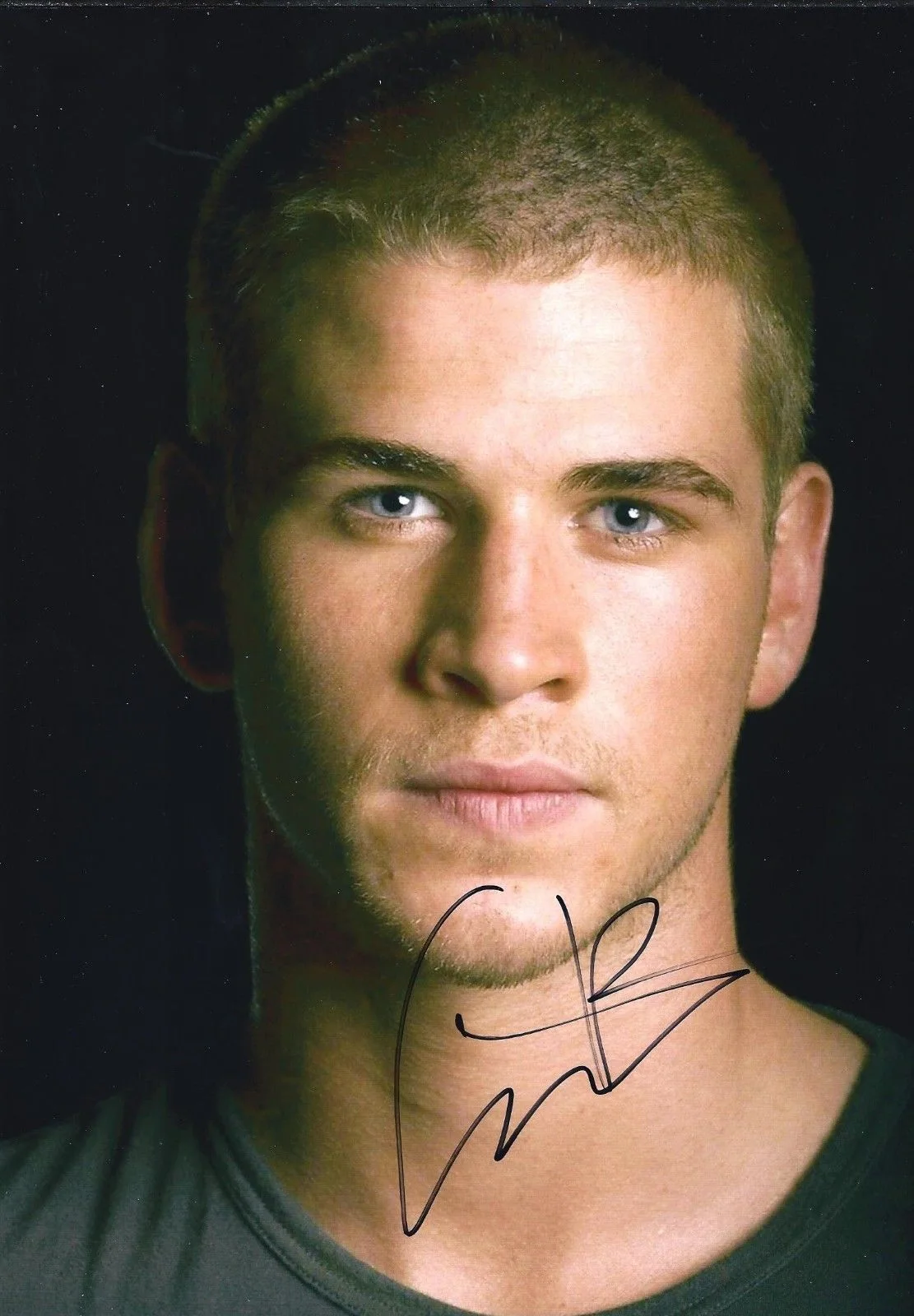 Liam Hemsworth — Liam Hemsworth signed 8x10 Photo in person Proof. Hunger Games Mockingjay