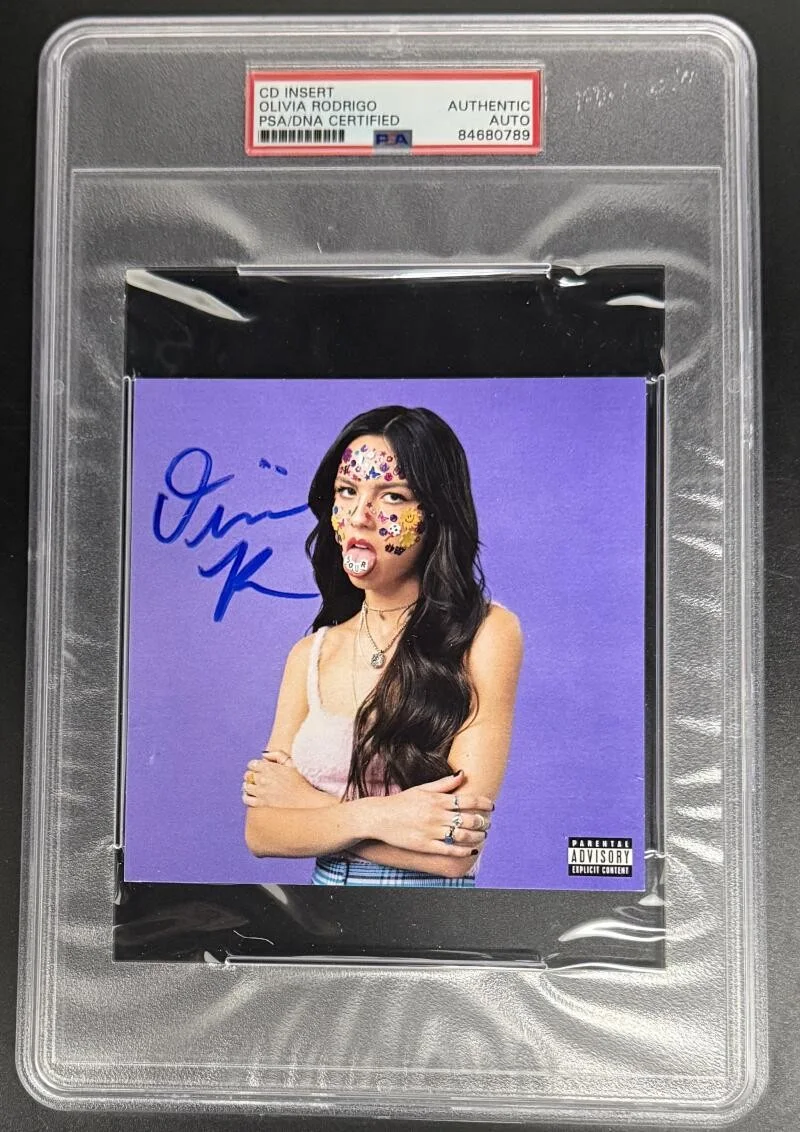 Olivia Rodrigo — Olivia Rodrigo Sour Signed Autograph PSA/DNA Encapsulated Slabbed CD Cover COA A