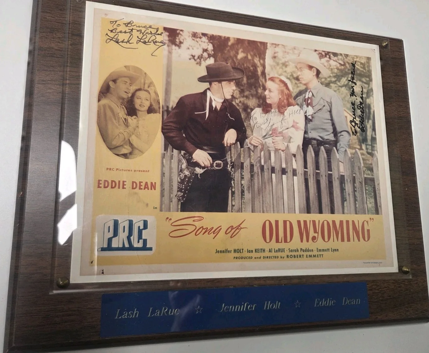 Lash La Rue, Jennifer Holt, Eddie Dean — SONG OF OLD WYOMING MOVIE CAST - INSCRIBED PHOTOGRAPH SIGNED WITH CO-SIGNERS