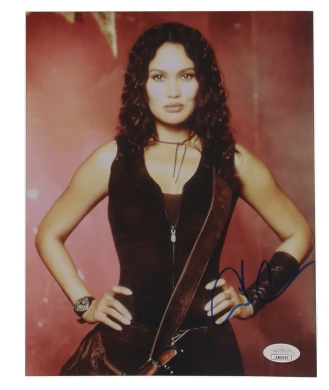 TIA CARRERE — TIA CARRERE (American actress) Relic Hunter Signed 8x10 Photo (JSA Basic COA)