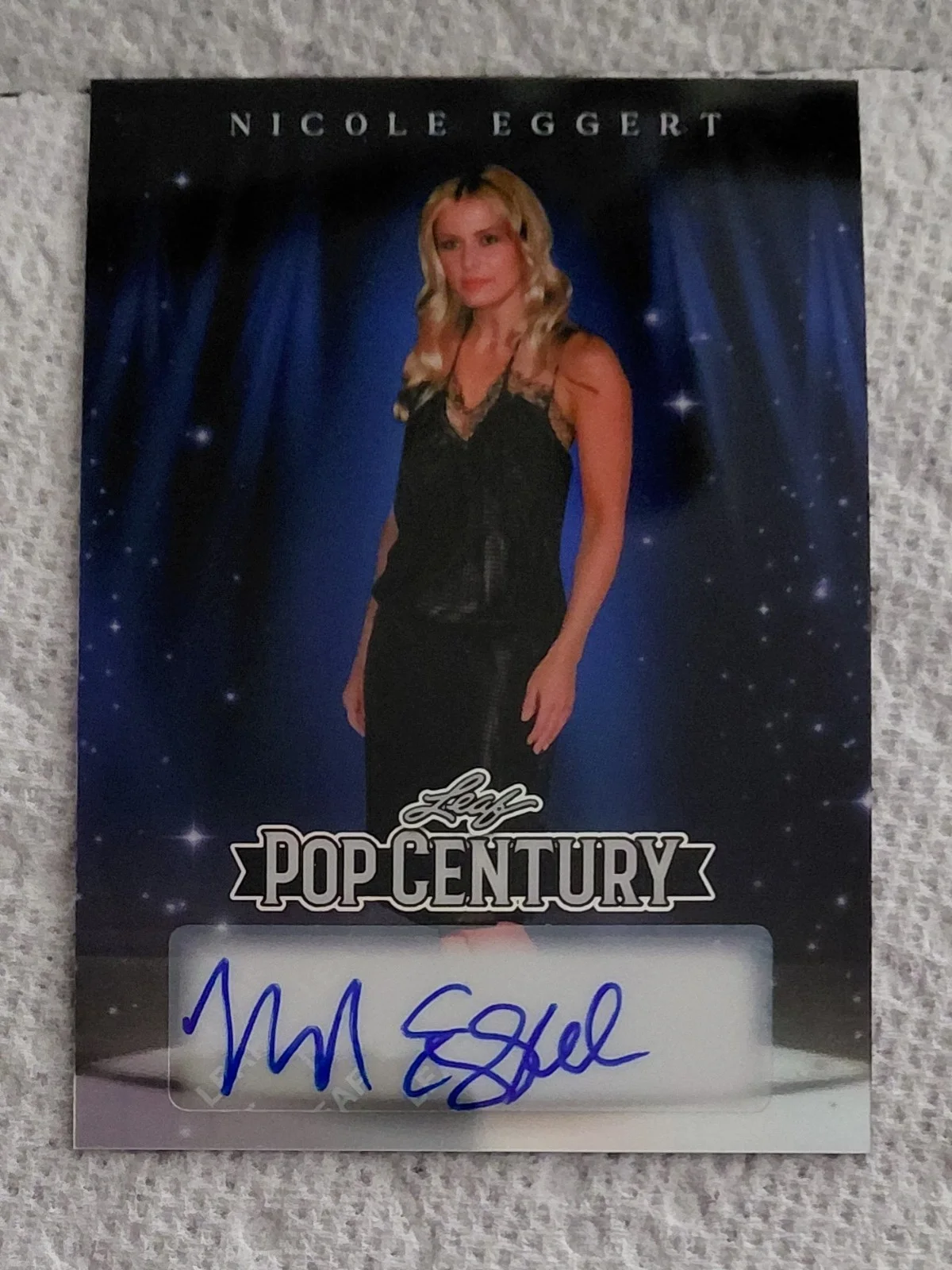 NICOLE EGGERT — 2026 POP CENTURY. NICOLE EGGERT. "BAYWATCH". AUTOGRAPH. DK BLUE PRISMATIC. 5/5.