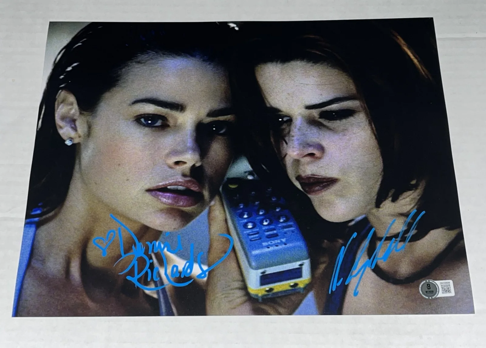 Neve Campbell — Neve Campbell & Denise Richards signed Wild Things 11x14 photo #3 BAS Witnessed