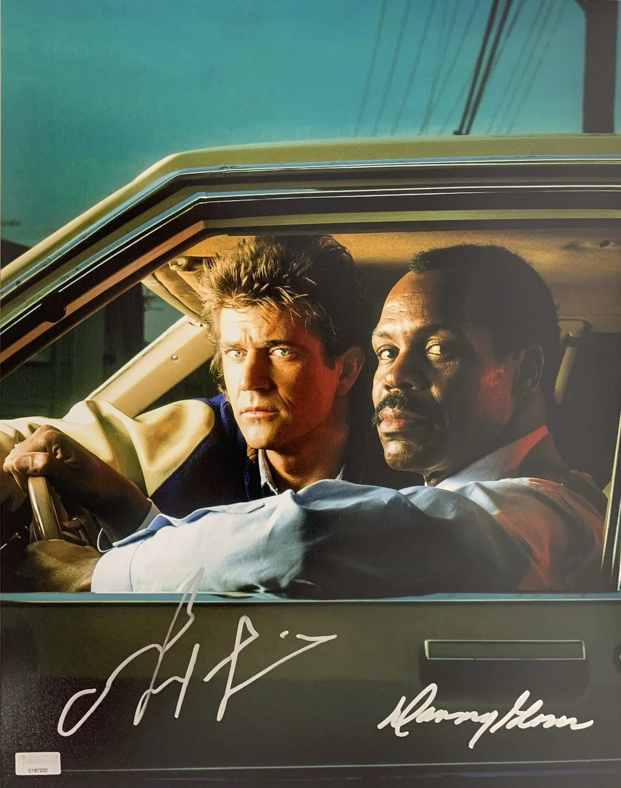 Mel Gibson and Danny Glover — Lethal Weapon - Mel Gibson and Danny Glover Signed 11x14 Photo - CA Cert C167200