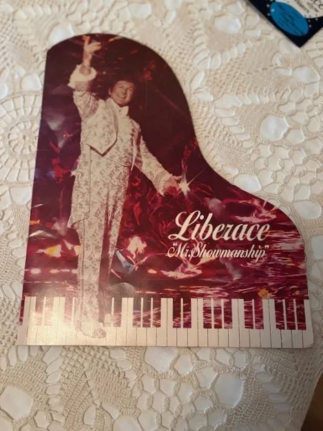 Liberace — Signed/Autographed 1980 Liberace postcard with advert, and Mr. Showman program, image 2