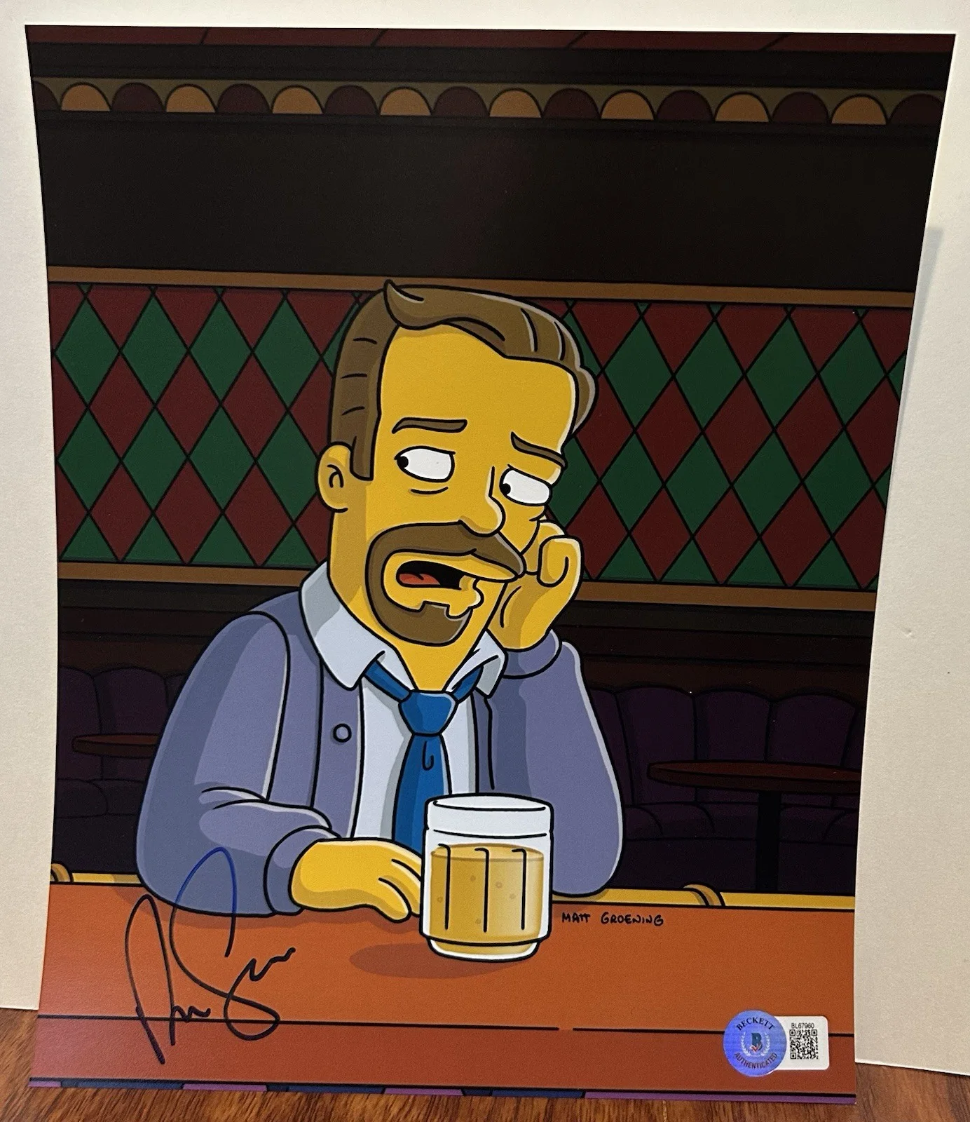 Ricky Gervais — RICKY GERVAIS THE SIMPSONS CHARLES HEATHBAR SIGNED 8x10 PHOTO BECKETT BAS