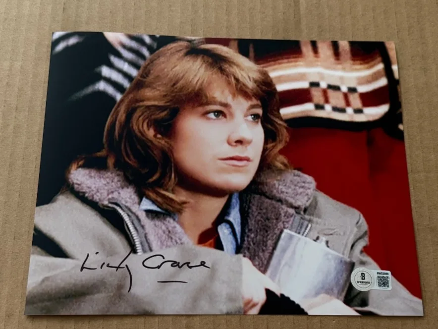 LINDSAY CROUSE — LINDSAY CROUSE SIGNED SLAP SHOT 8X10 PHOTO BECKETT BAS HAND SIGNED #2