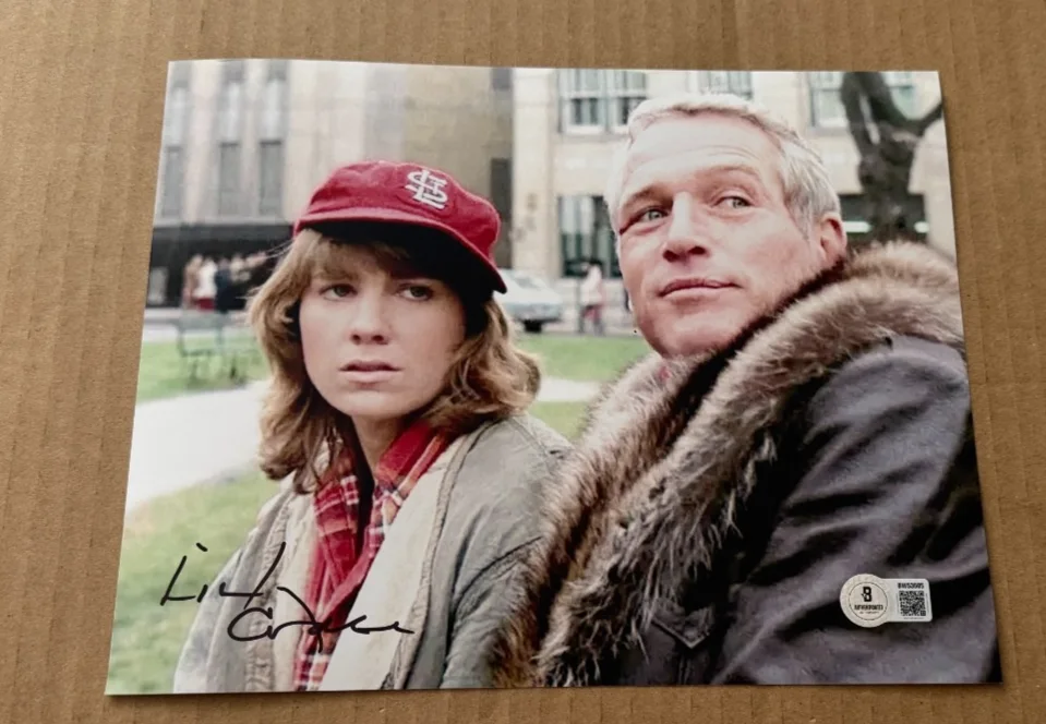 LINDSAY CROUSE — LINDSAY CROUSE SIGNED SLAP SHOT 8X10 PHOTO BECKETT BAS HAND SIGNED