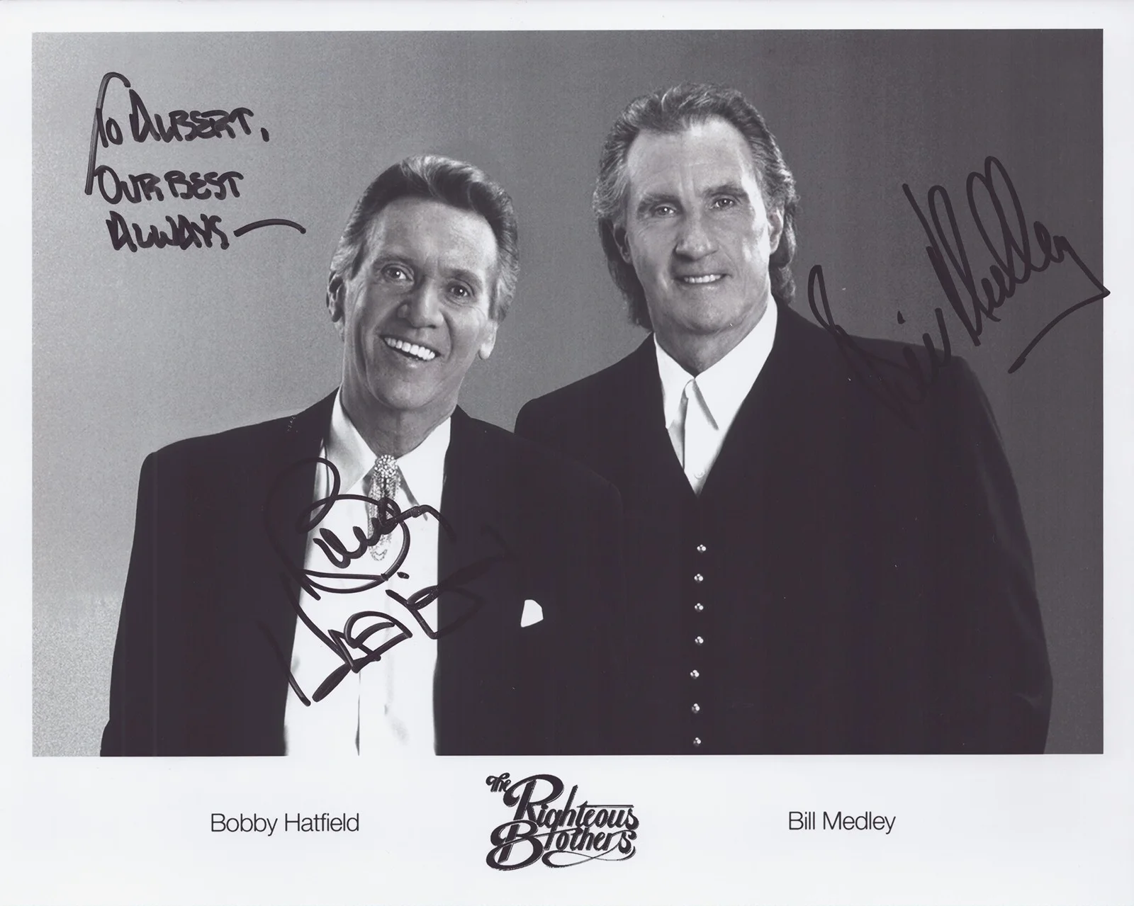 The Righteous Brothers, Bobby Hatfield, Bill Medley — THE RIGHTEOUS BROTHERS - AUTOGRAPHED INSCRIBED PHOTOGRAPH WITH CO-SIGNERS