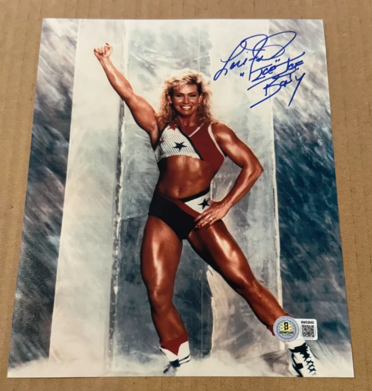 LORI FETRICK — LORI FETRICK SIGNED AMERICAN GLADIATOR 8X10 PHOTO BECKETT BAS HAND SIGNED #2