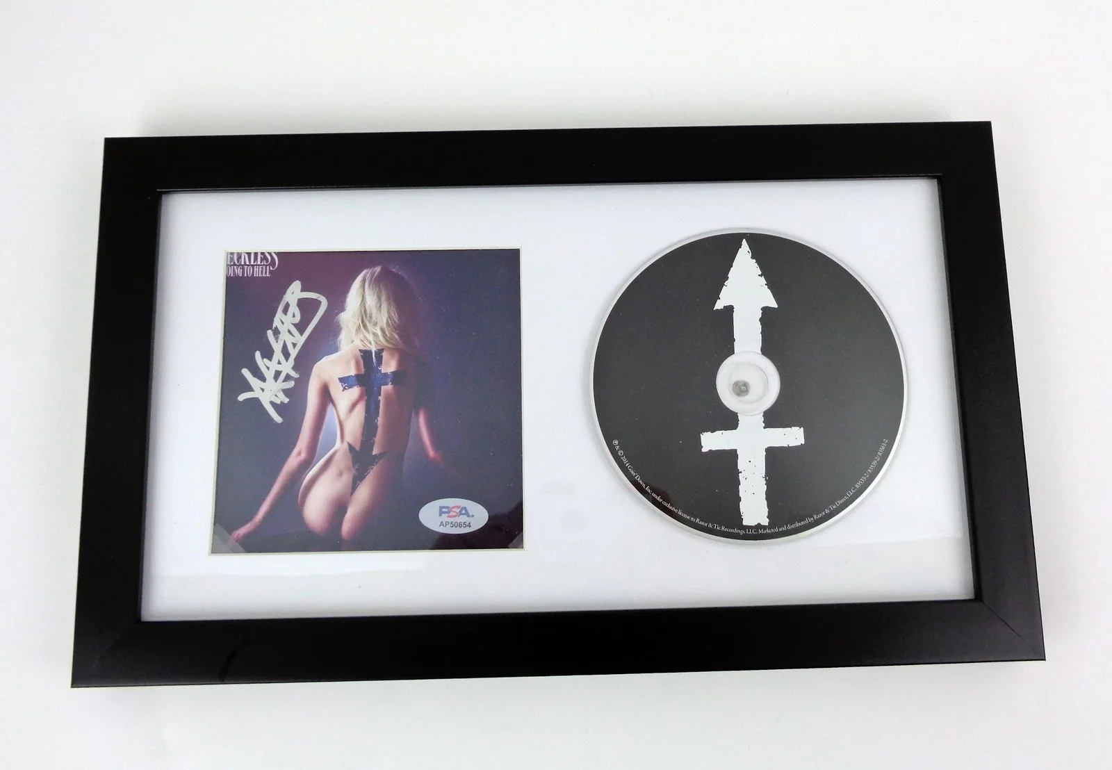 Taylor Momsen — Taylor Momsen Signed The Pretty Reckless Going To Hell CD Framed PSA/DNA COA