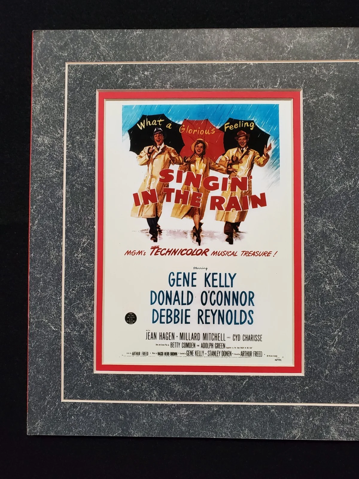Gene Kelly, Debbie Reynolds, Donald O'Connor — Gene Kelly, Debbie Reynolds, Donald OConnor SINGIN IN THE RAIN Autograph Display, image 5