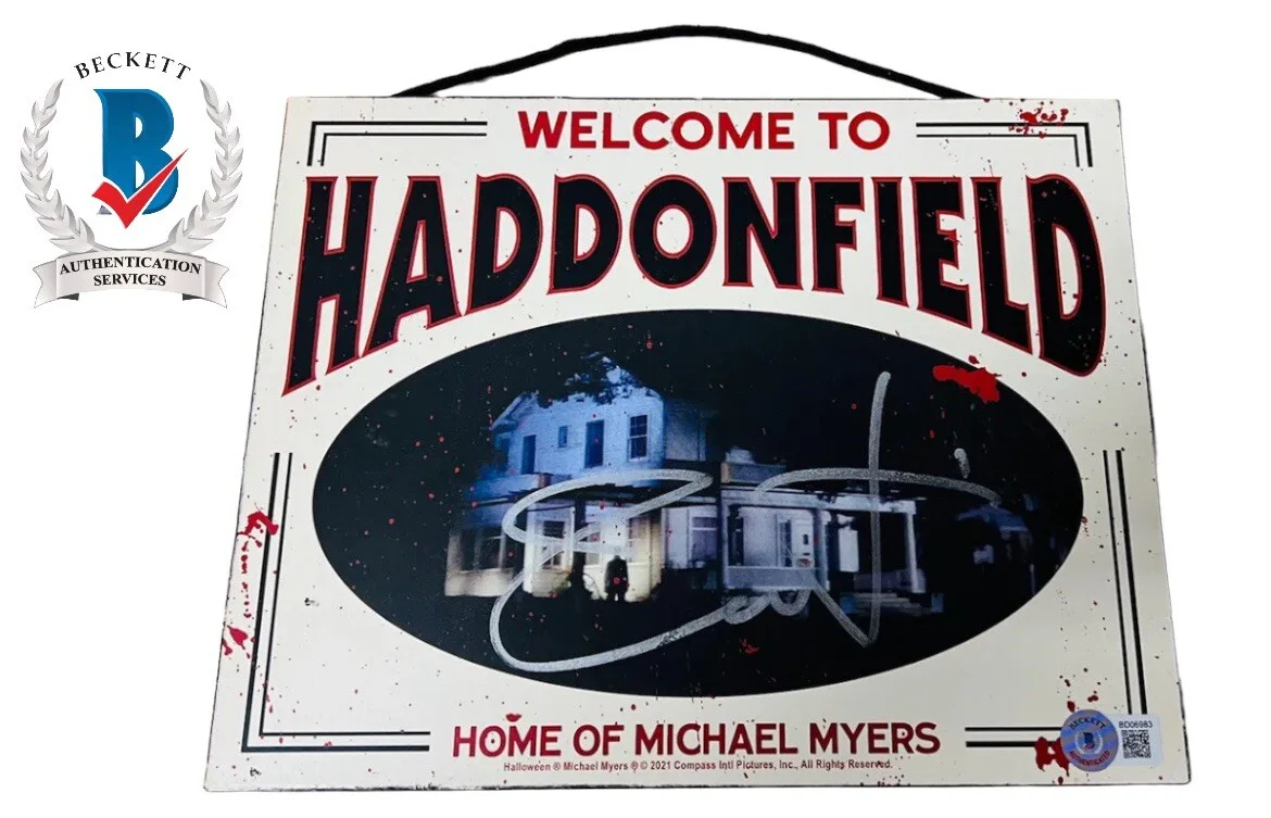 Jamie Lee Curtis — JAMIE LEE CURTIS SIGNED HADDONFIELD HALLOWEEN WOODEN SIGN BECKETT MICHAEL MYERS