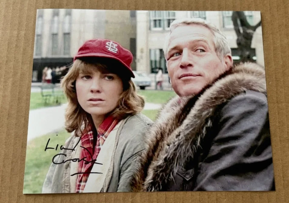 LINDSAY CROUSE — LINDSAY CROUSE SIGNED SLAP SHOT 8X10 PHOTO W/COA HAND SIGNED