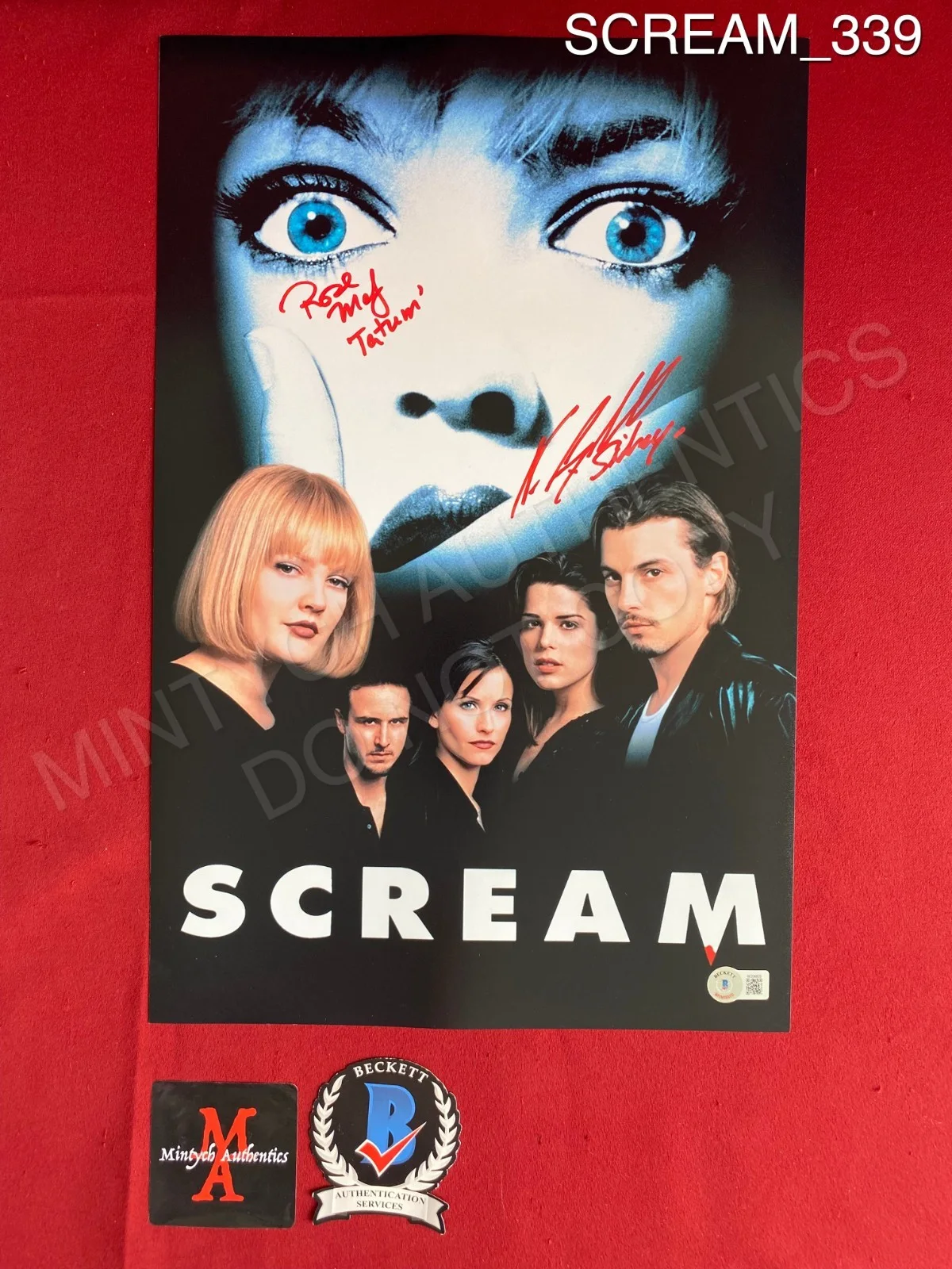 Neve Campbell, Rose McGowan — Neve Campbell Rose McGowan dual signed Scream 11x17 photo Beckett COA