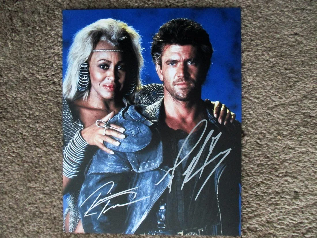 Tina Turner & Mel Gibson — Tina Turner & Mel Gibson Mad Max Autographed 8X10