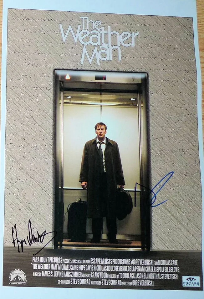Nicolas Cage & Hope Davis — Nicolas Cage & Hope Davis signed Weather Man 11x17 poster. In Person Exact Proof