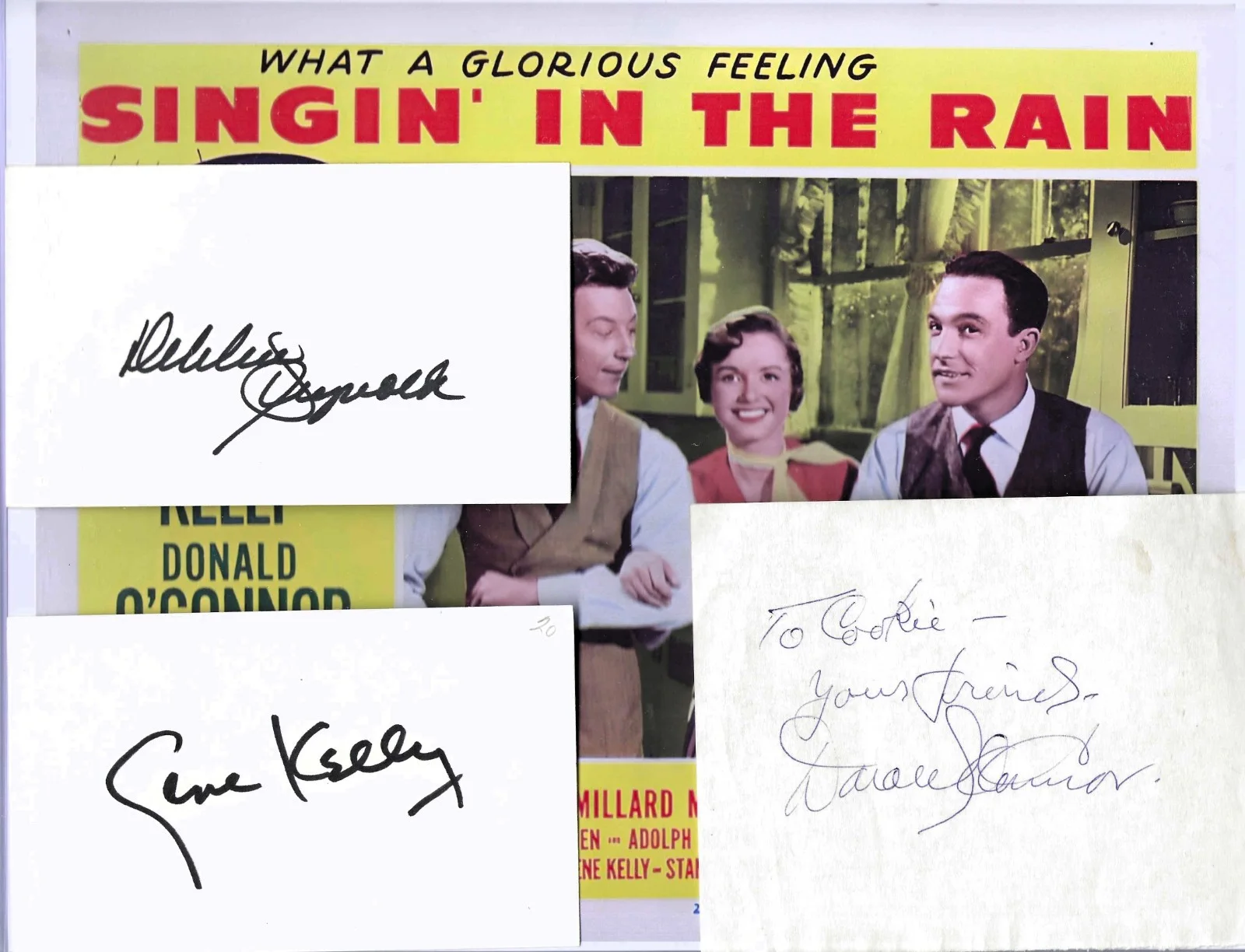 GENE KELLY, Donald O'Connor, DEBBIE REYNOLDS — SINGING IN THE RAIN cast autographs GENE KELLY, Donald O'Connor, DEBBIE REYNOLDS