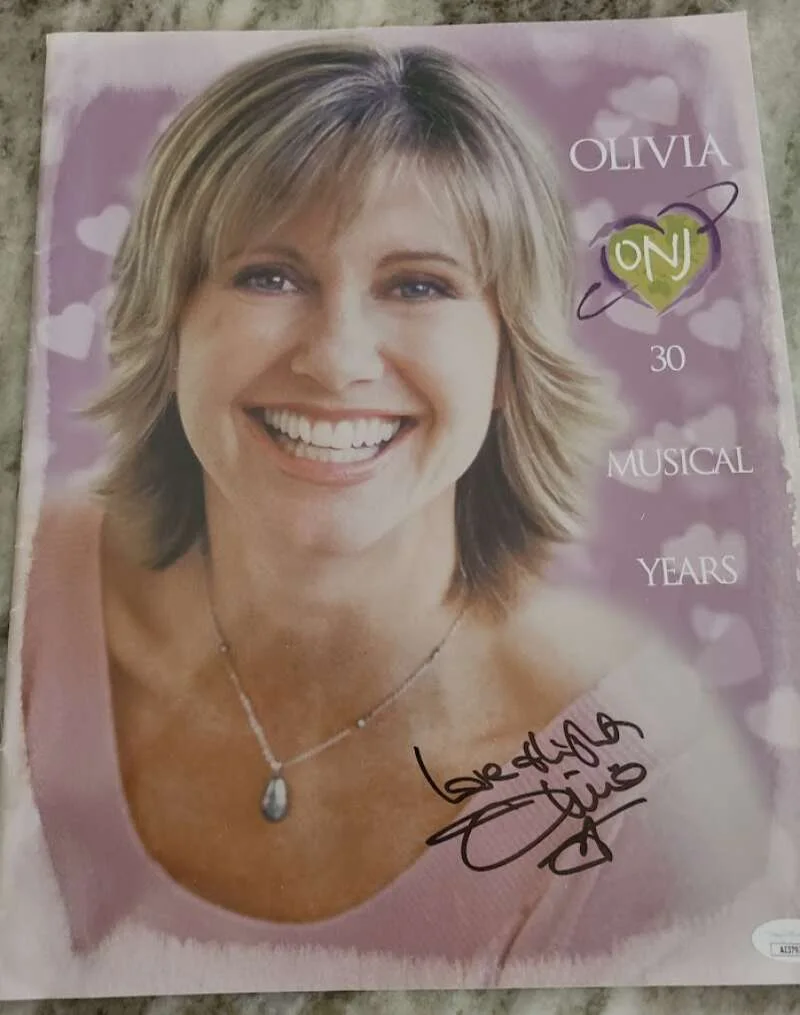 Olivia Newton John — Olivia Newton John JSA Coa Signed 11x14 30 Musical Years Book Autograph
