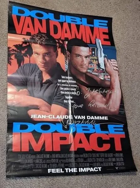 Jean-Claude Van Damme — Double Impact Movie Poster Signed by Jean-Claude Van Damme - 27"X41"
