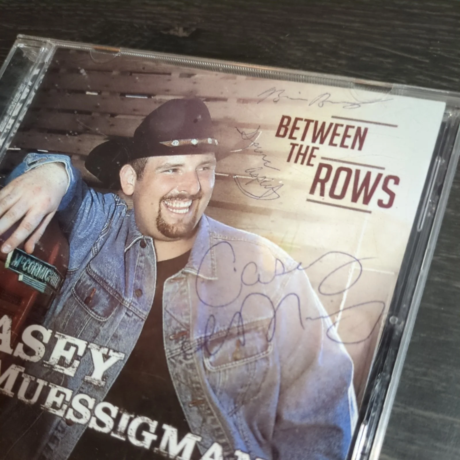 "Between The Rows" Casey Muessigmann Hand Signed CD Used US Based Seller, image 2