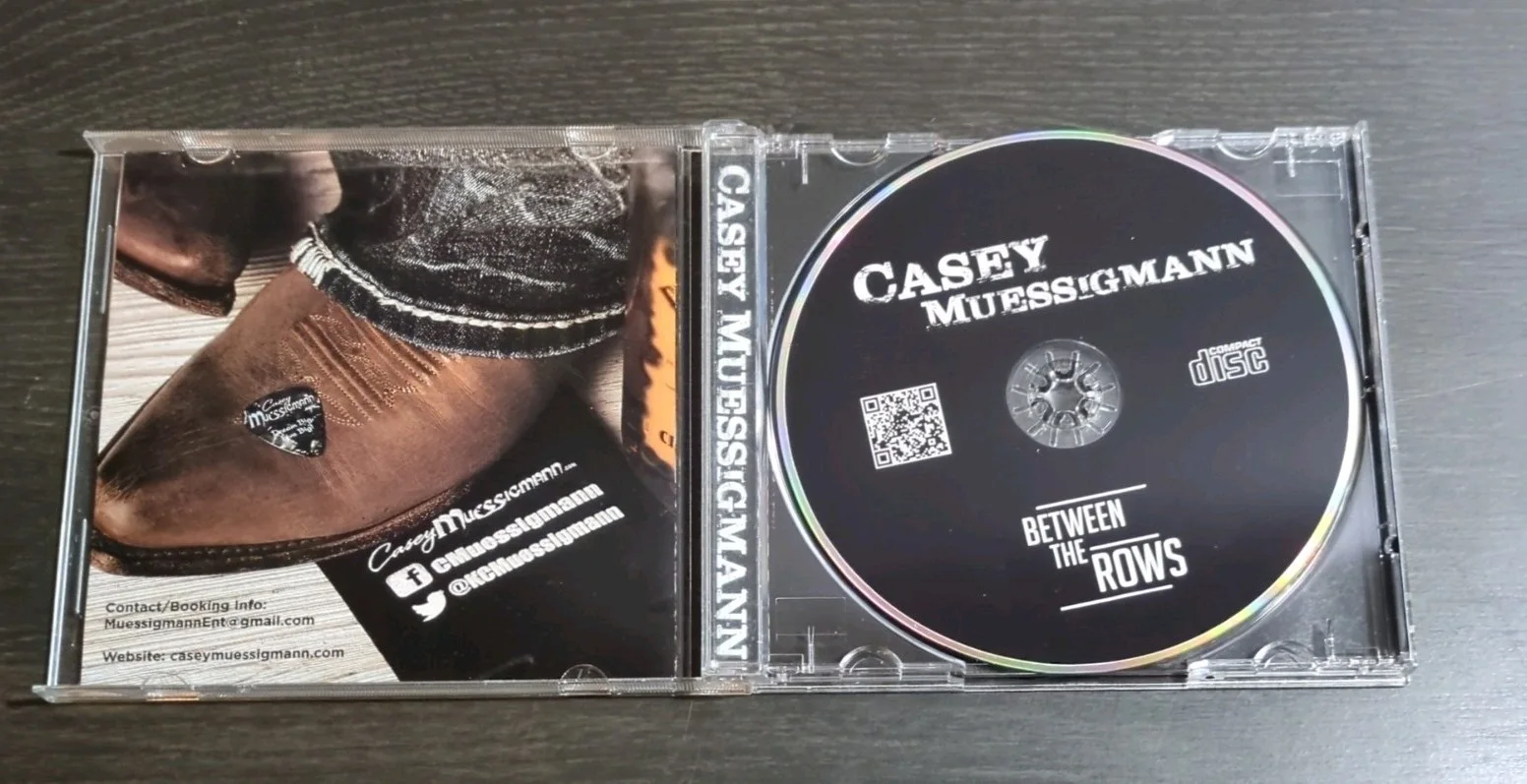 "Between The Rows" Casey Muessigmann Hand Signed CD Used US Based Seller, image 3