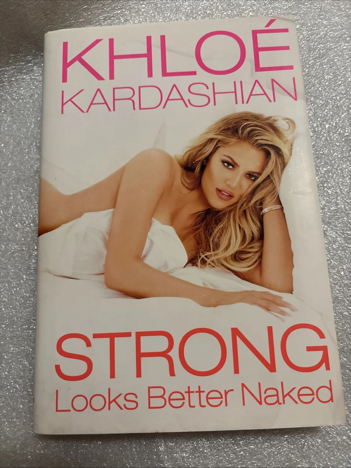 Khloe Kardashian — Khloe Kardashian SIGNED Hardcover Book Strong Looks Better Naked Autograph 1st