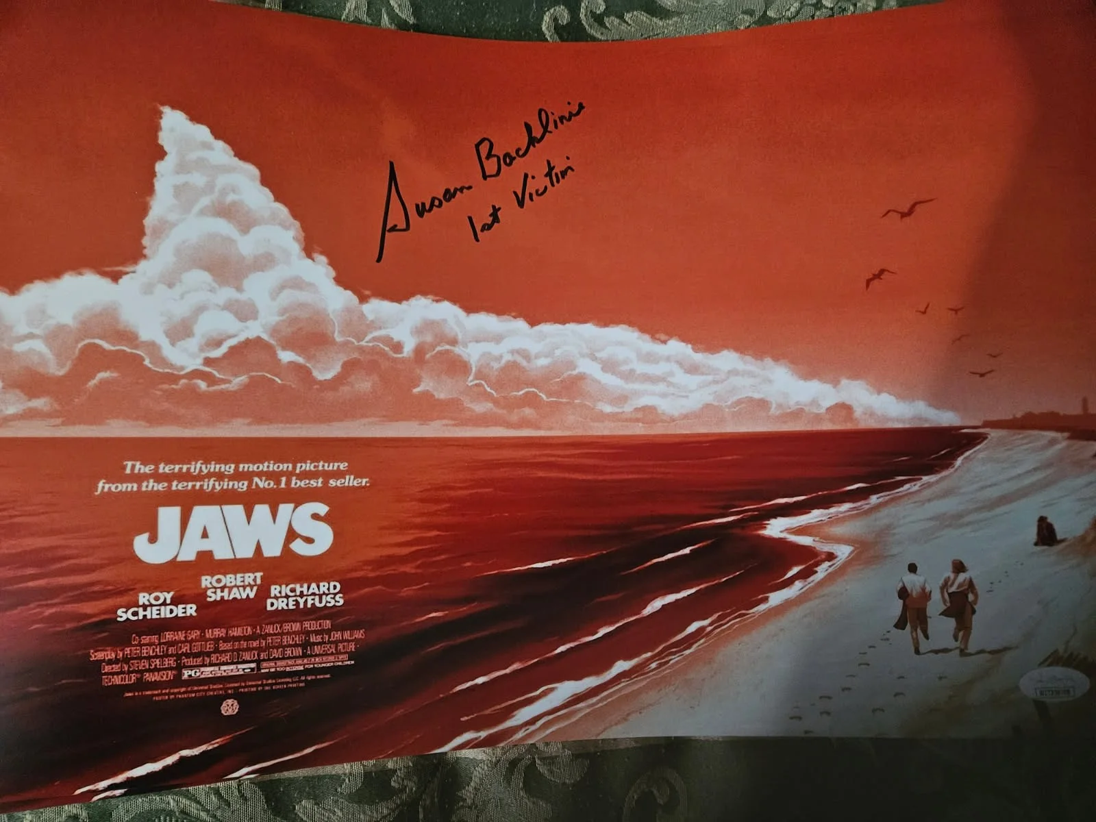 Jaws 1st victim — JAWS 1st victim autographed 11x17 on beach color photo JSA Certified