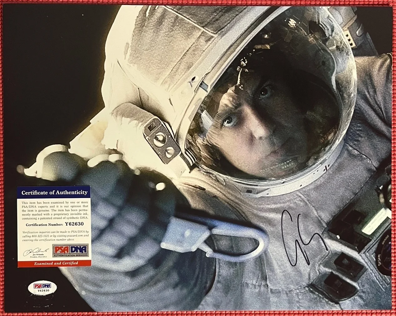 George Clooney — PSA DNA autographed GEORGE CLOONEY signed "GRAVITY" 14"x 11" Photo