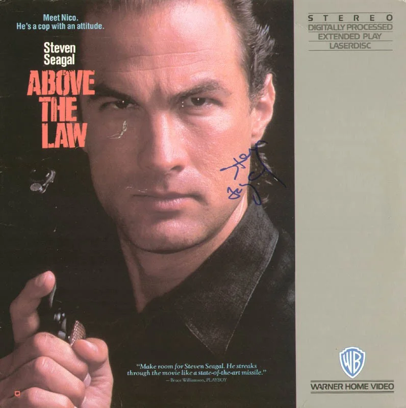 Steven Seagal — STEVEN SEAGAL - LASER MEDIA COVER SIGNED