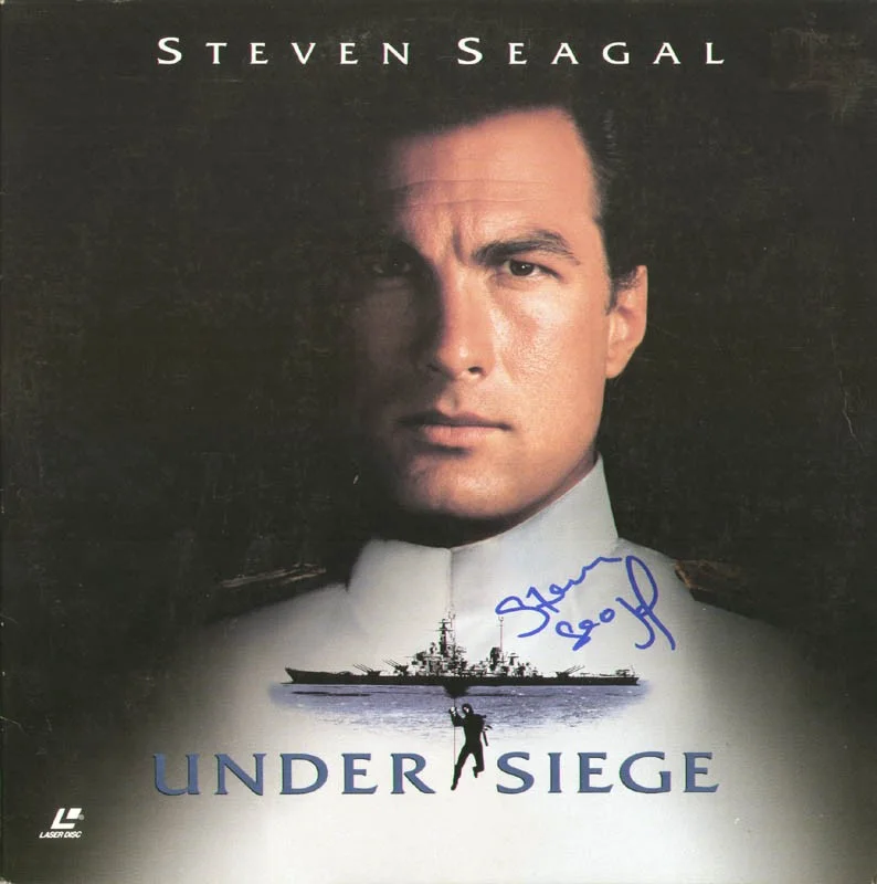 Steven Seagal — STEVEN SEAGAL - LASER MEDIA COVER SIGNED