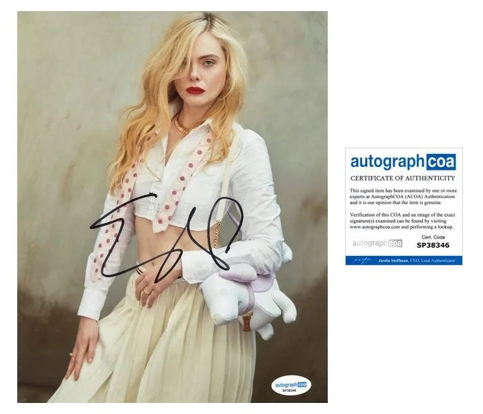 Elle Fanning — Elle Fanning "The Hunger Games: Sunrise on the Reaping" SIGNED 8x10 Photo ACOA