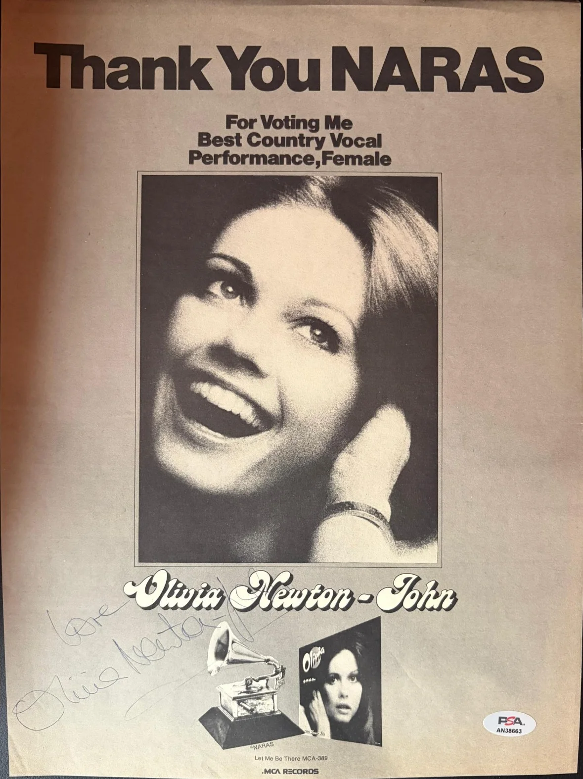 Olivia Newton John — OLIVIA NEWTON-JOHN SIGNED AUTOGRAPHED MAGAZINE PAGE VINTAGE FULL NAME RARE PSA Q