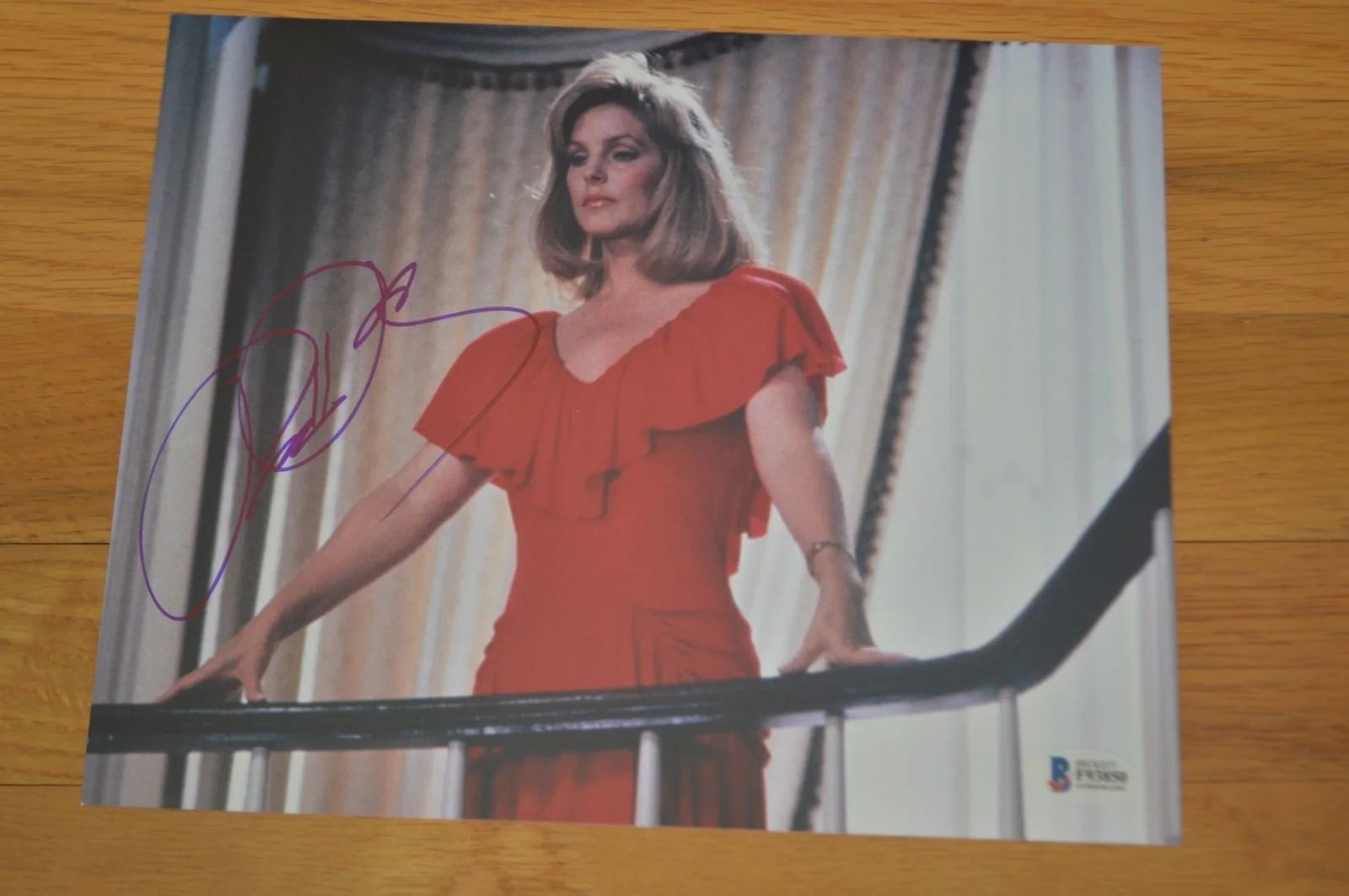 Priscilla Presley — Priscilla Presley Autographed "The Naked Gun" 8x10 Photo w/ Beckett Hologram