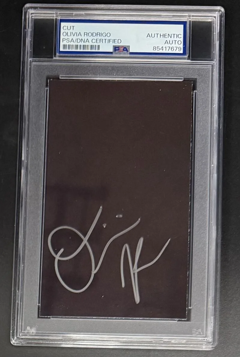 Olivia Rodrigo — Olivia Rodrigo Signed Autograph PSA/DNA Slabbed Encapsulated 3x5 Card COA